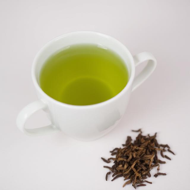 A cup of green tea rich in antioxidants and catechins that support immune function.